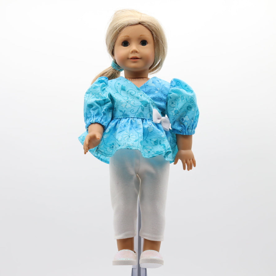 Aqua blue cotton seersucker flower pattern top with White knit crop pants