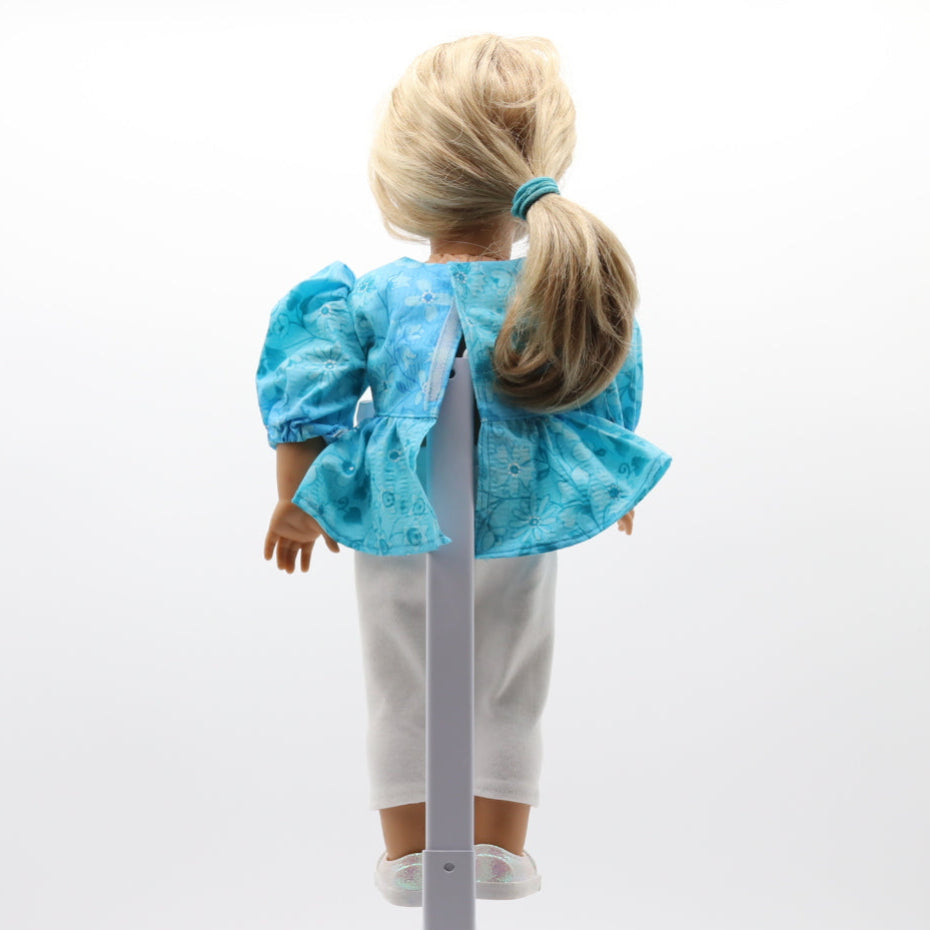 Aqua blue cotton seersucker flower pattern top with White knit crop pants